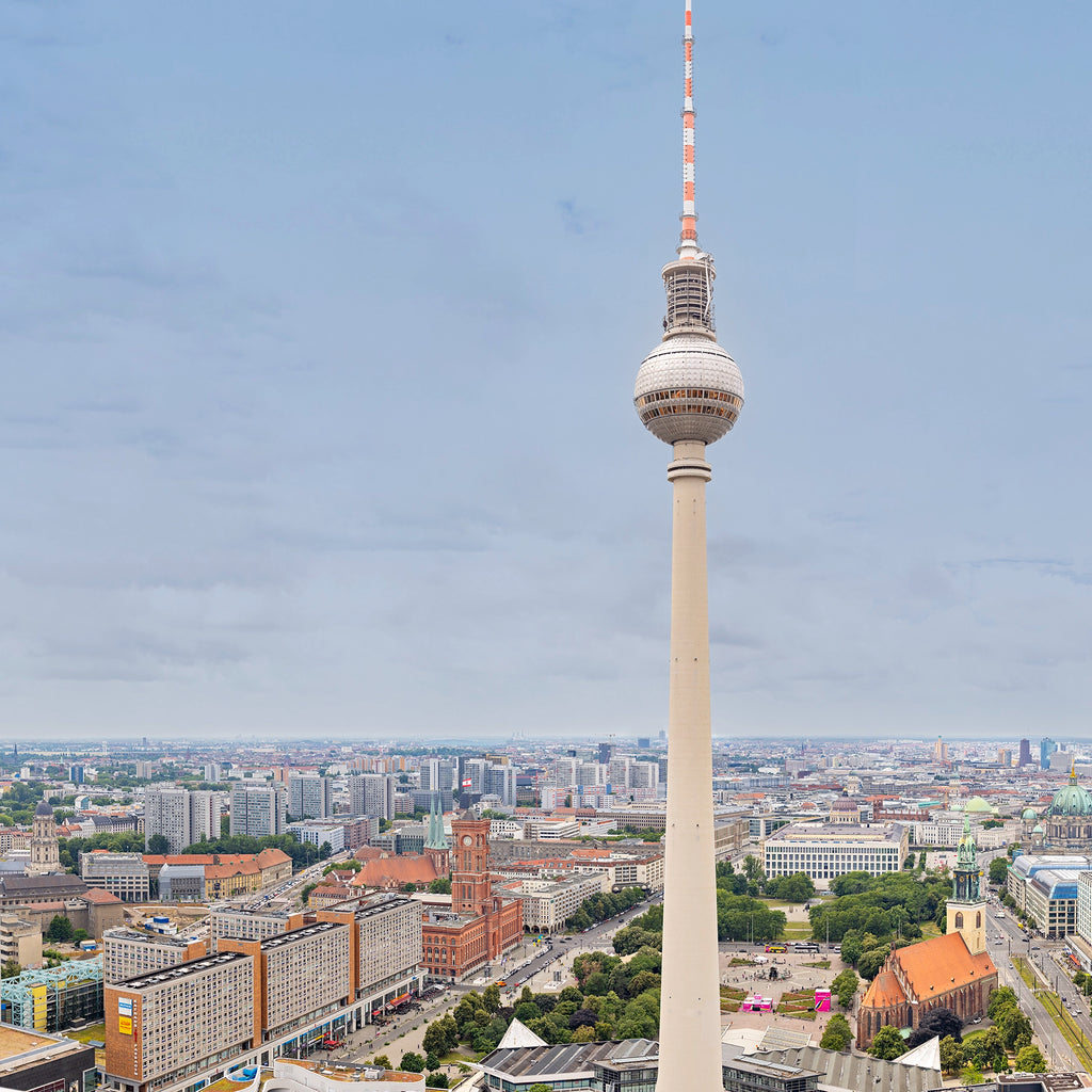 Tall tower with a cityscape in the background