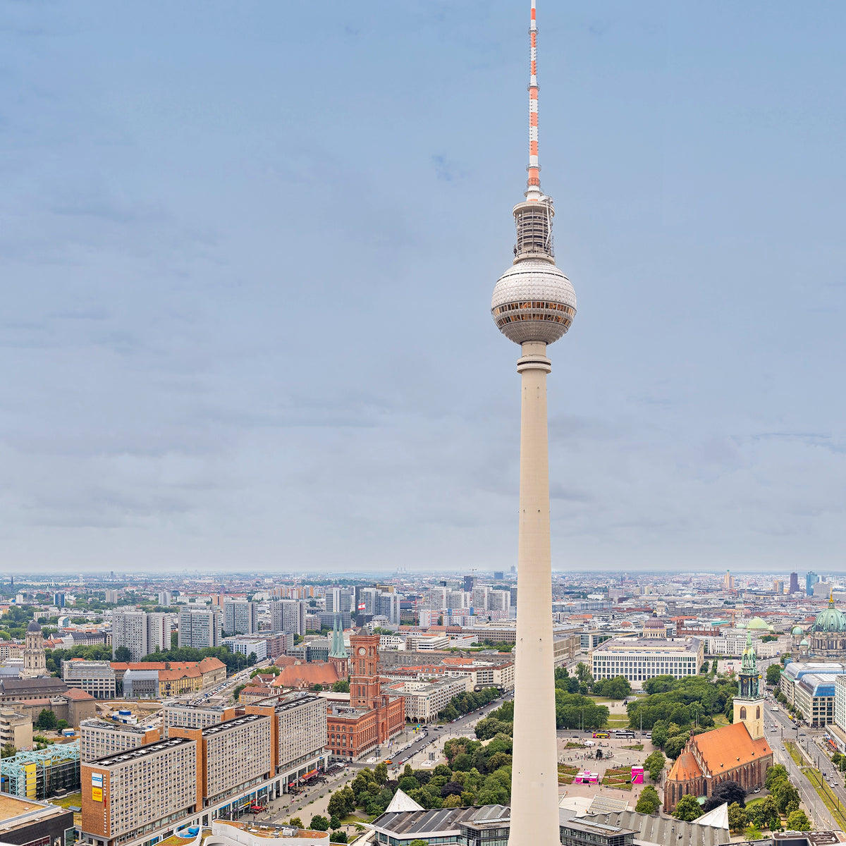 Tall tower with a cityscape in the background